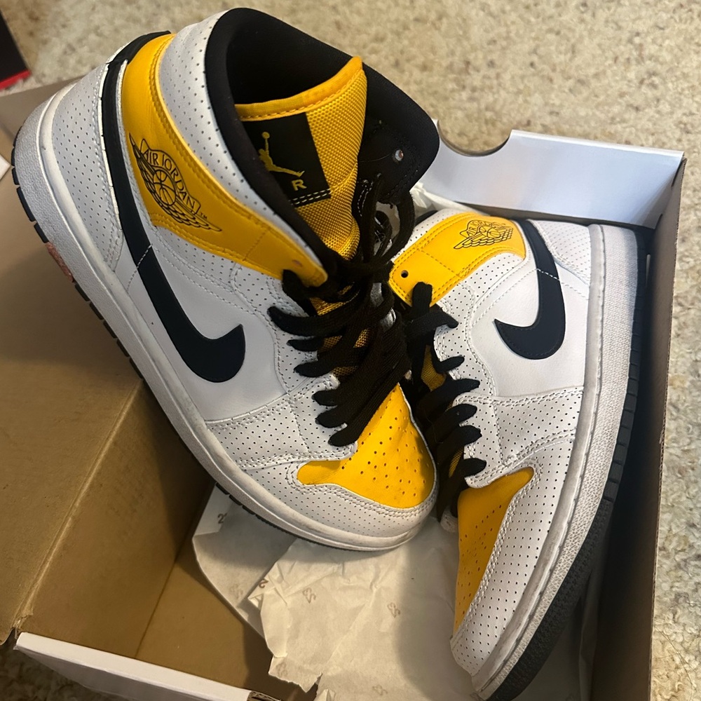 Yellow and black with white Jordans